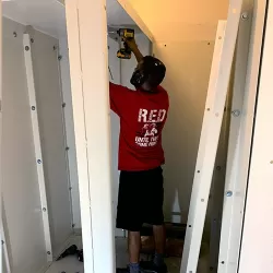 Armored Closet being installed in a residential closet